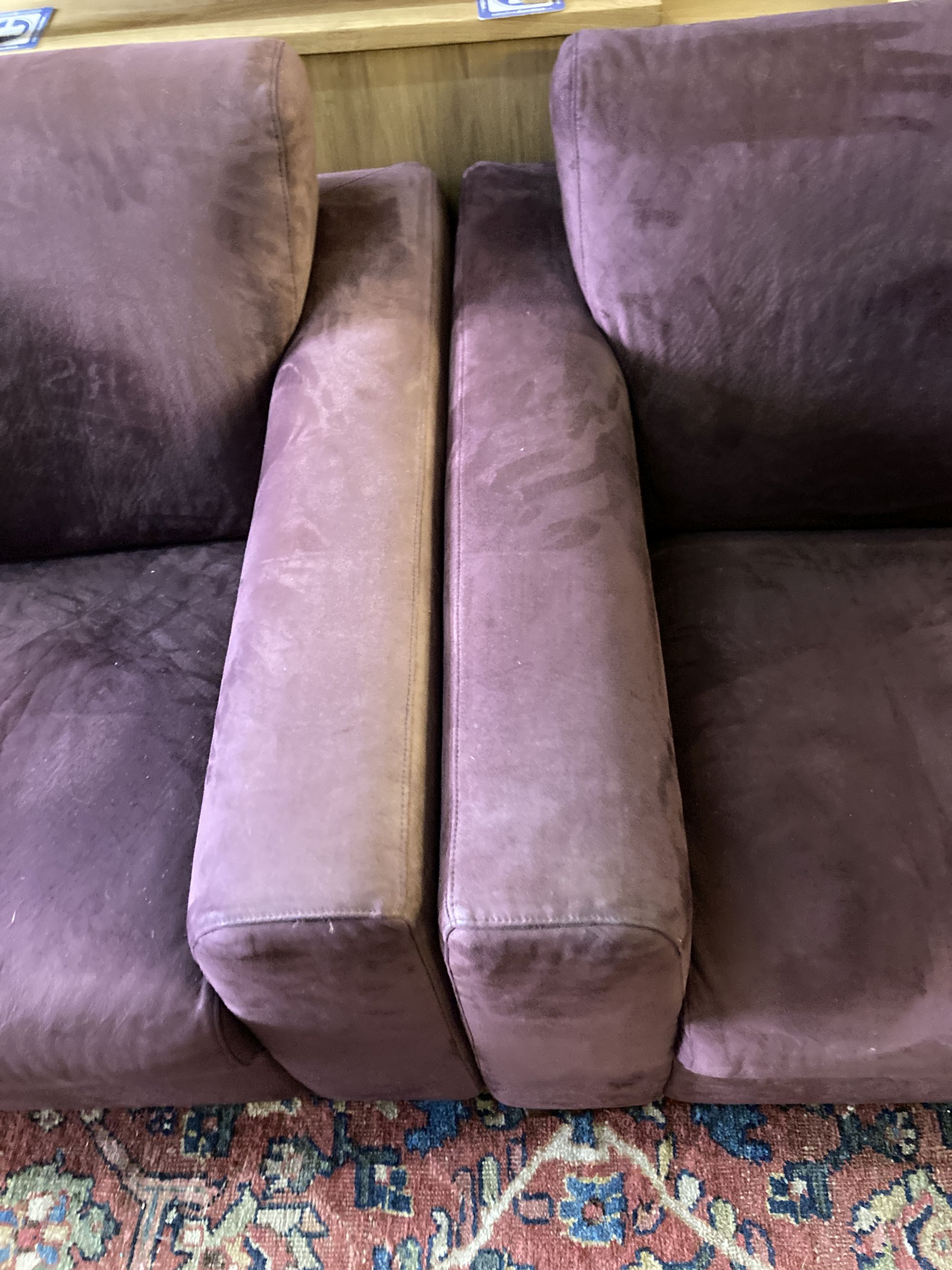 A pair of modern two-seater settees covered in suede, length 170cm, depth 94cm, height 80cm